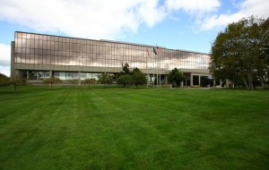 office building with manicured lawn