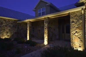 landscape lighting illuminating house