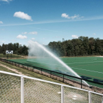 sprinkler watering athletic field