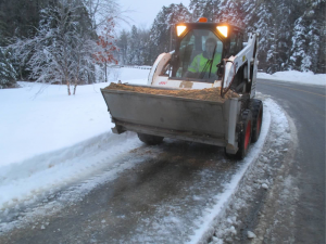 bobcat equipment sanding walkway