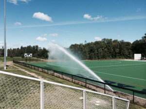 sprinkler watering athletic field